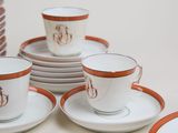 four cups and saucers sitting on a table