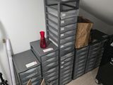 a room with a lot of boxes and a camera on the floor