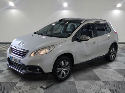 a picture of a white car that is parked in a garage