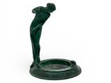 green statue of a man holding a golf club on a white background