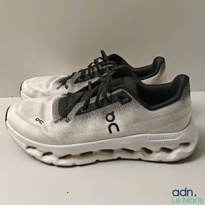 on running shoes on a table with a white background