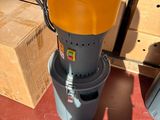 a yellow bucket sitting on top of a gray bucket