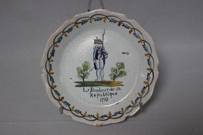 a plate with a picture of a soldier on it