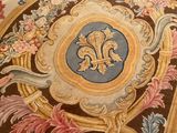 an image of a rug with a floral design on it