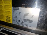 a label on the back of a machine that is not working