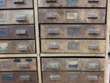 many drawers that are stacked on top of each other