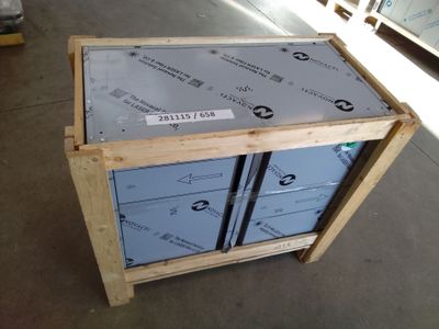 a wooden box that has some boxes on top of it