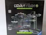 the box is open to show the model of a futuristic city
