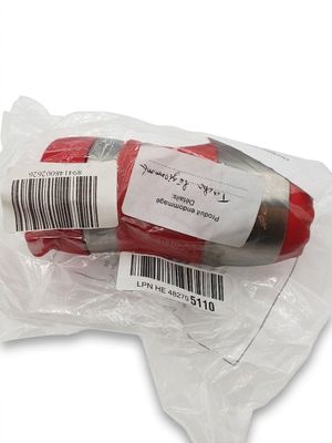 a red object wrapped in plastic with a barcode on it