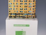a small model of a building on top of a box