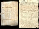 un vieux document écrit posé sur une table