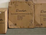 three cardboard boxes are stacked on top of each other in a room