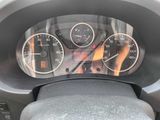 a close up of a car dashboard with a speedometer