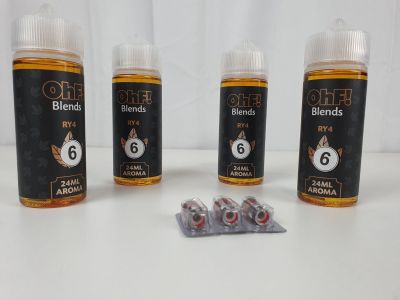 trois bouteilles de liquide posées les unes à côté des autres sur une table