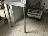 an image of a commercial kitchen with a toaster on a table