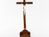 a wooden cross with a crucif on top of it