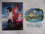 deux affiches de cinéma représentant une femme et un chat sur fond blanc