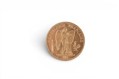 a close up of a coin on a white surface