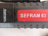 a close up of a bicycle tire with a red sticker on it