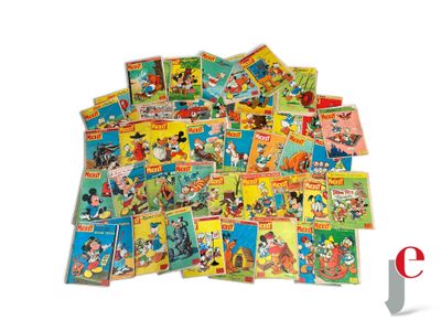 a pile of cartoon books on a white surface