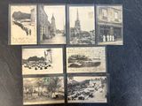 several old black and white photos of a city street and buildings