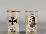 two shot glasses with a picture of a man and a woman on them