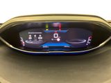 the dashboard of a car with a digital display on it