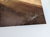 a close up of a business card with a signature on it