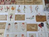 a lot of cards on the table with pictures on them