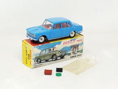 a blue toy car sitting on top of a box