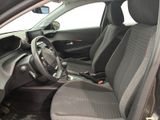 the interior of a car with a steering wheel and seat covers