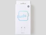 une boîte blanche sur laquelle est collé un autocollant bleu portant l'inscription « buds »