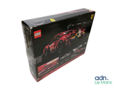 a box that has a lego car inside of it