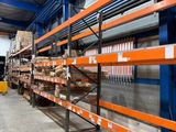 shelves in a warehouse filled with lots of different types of items
