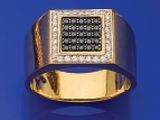 gros plan d'une bague en or avec des diamants noirs et blancs