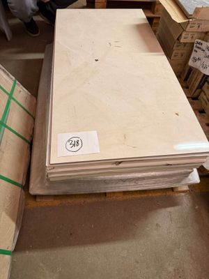 a lot of boxes and boxes of wood in a warehouse