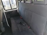 a seat in the back of a van that is empty