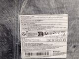a plastic bag with a label on it sitting on a table
