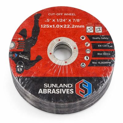 an image of a metal grinding wheel on a white surface
