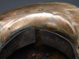a close up of a metal object on a table