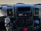 a picture of a dashboard of a truck with a lot of cars in the background