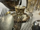 a table with silverware and silverware on it