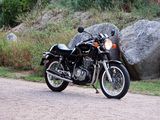 a motorcycle that is parked on the side of the road