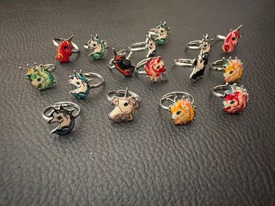 a lot of rings that are sitting on a table