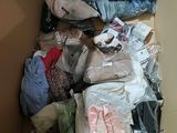 a box full of clothes and other items that are in it