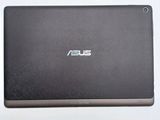 the back of the asus laptop is shown on a white surface