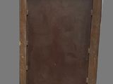 a close up of a wooden frame with a brown door