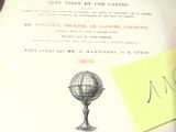 un livre sur lequel est posée une image représentant un globe terrestre