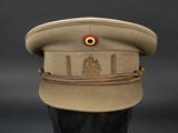 an image of a military hat with a red eye on it