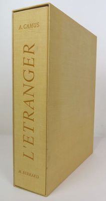 a gold book box with the title of a novel on it